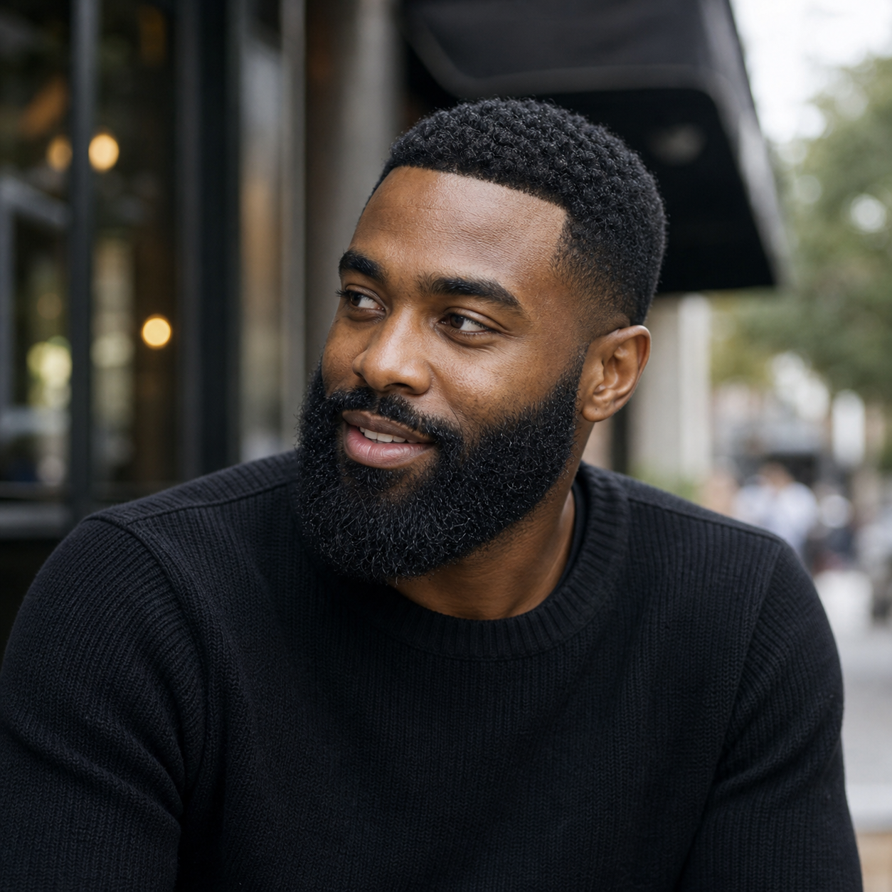 Customer with black hair and dense black beard
